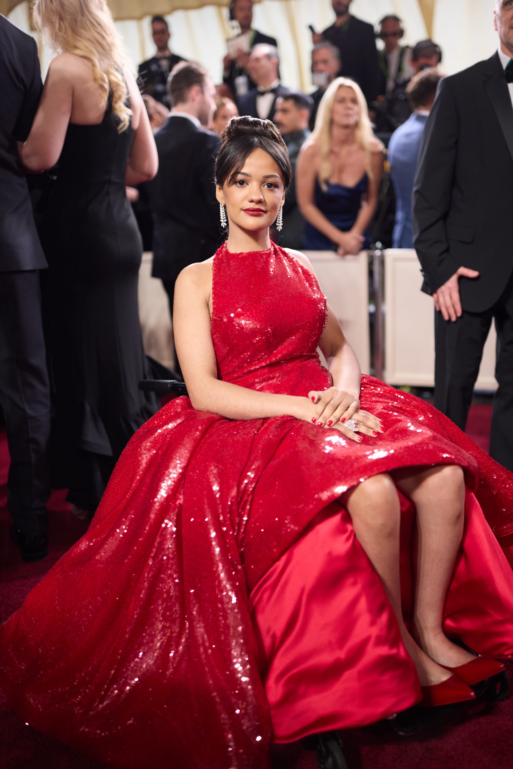 Marissa Bode wears a red dress.