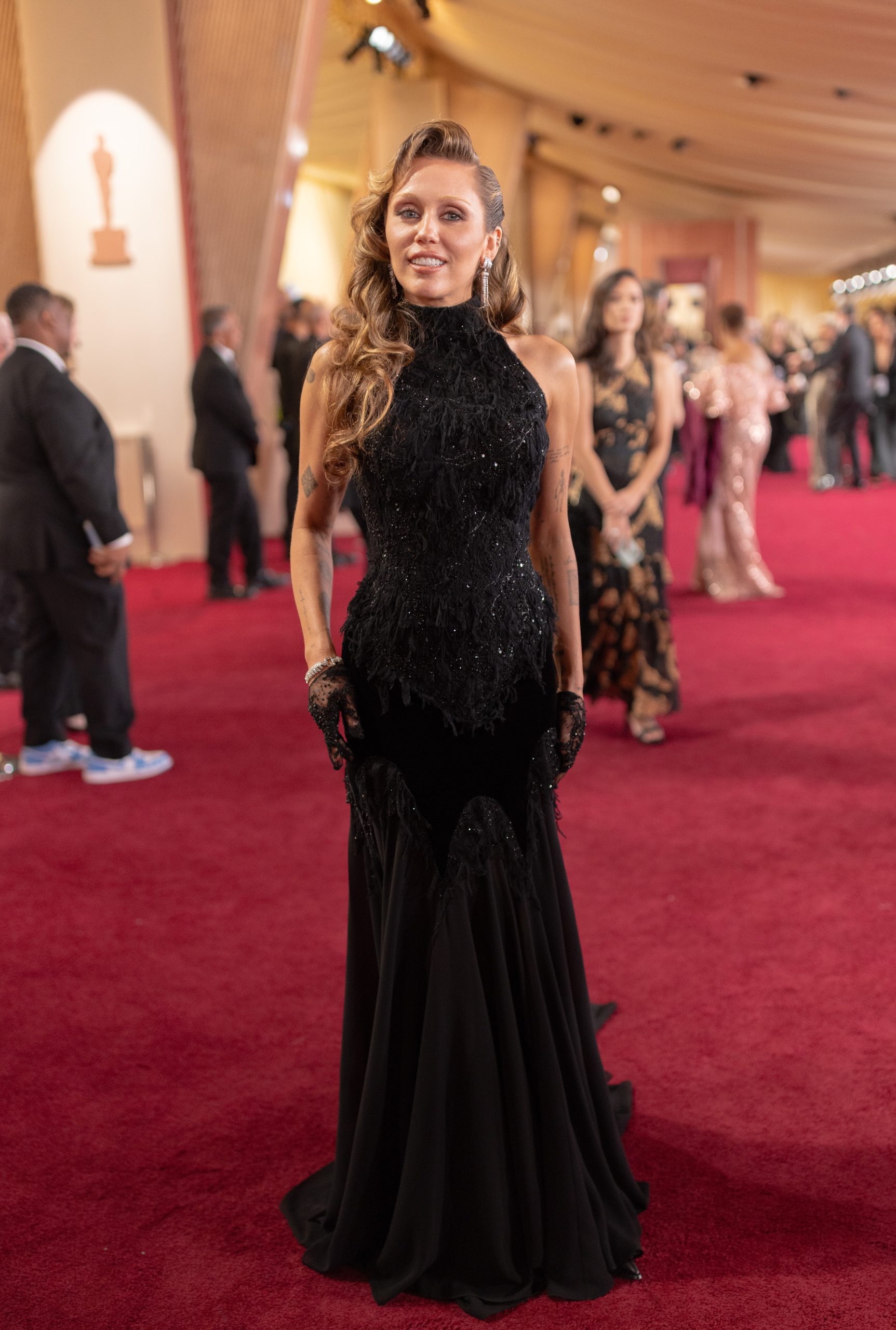 Miley Cyrus arrives on the red carpet of the 97th Oscars® at the Dolby® Theatre at Ovation Hollywood on Sunday, March 2, 2025.